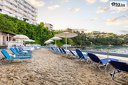 Почивка на о-в Корфу през цялото лято! 4 нощувки със закуски и вечери в Oasis Hotel Corfu + самолетни билети, от Далла Турс