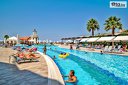 Почивка в Кушадасъ! 5 Ultra All Inclusive нощувки в Sealight Resort Hotel 5* + басейни и СПА + Безплатно за дете до 13 г. от Глобус Холидейс