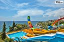 На море в Кушадасъ! 7 Ultra All Inclusive нощувки в Sealight Resort Hotel 5* + басейни и СПА + Безплатно за дете до 13 г. от Глобус Холидейс