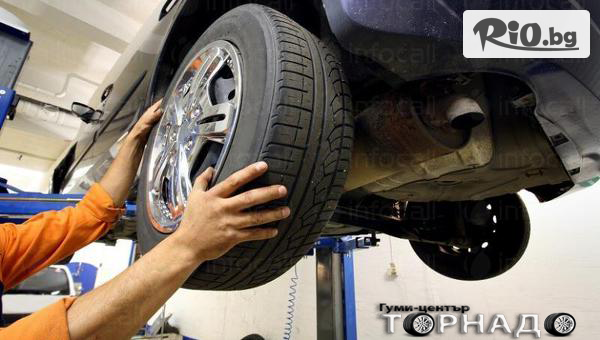 Смяна на 2 броя гуми до 23 цола - сваляне, качване, демонтаж, монтаж и баланс с до 53% отстъпка, предоставено от Автосервиз Торнадо
