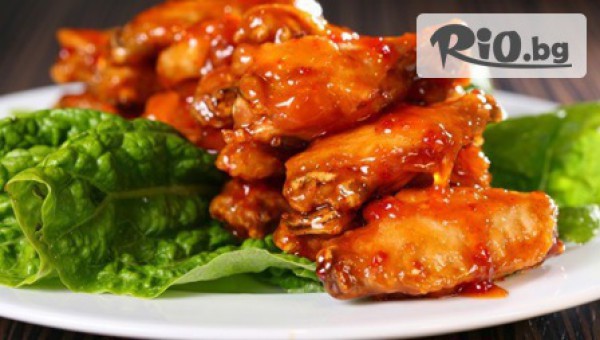 Юнашко хапване за цялата компания! 1кг. пилешки крилца на скара и 2 бр. хрупкави пърленки или 2.3кг. комбинирано плато на цена от 6.50лв, от Ресторант Шармант